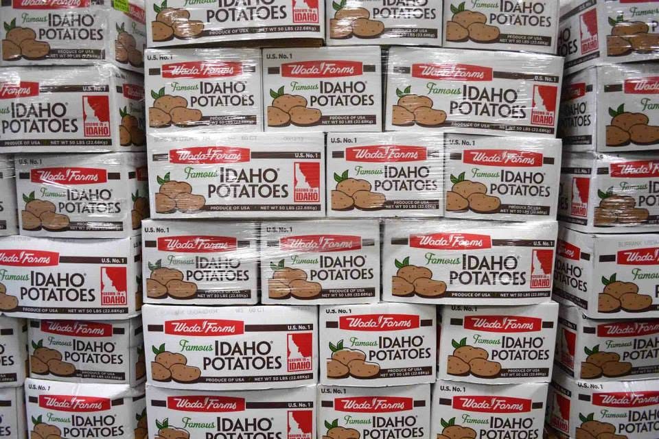 Stacks of 50-pound cartons of Famous Idaho Potatoes ready to ship